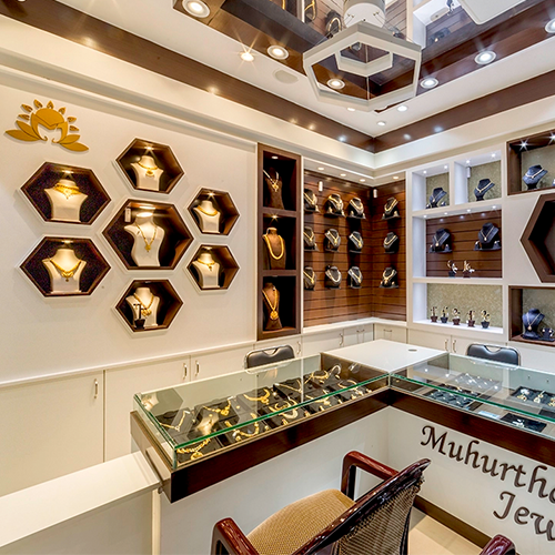 Elegant jewellery showroom interiors in Trichy with modern displays and lighting that highlight every piece.